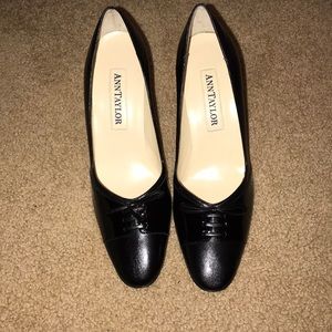 Black heels with lace up detailing on front